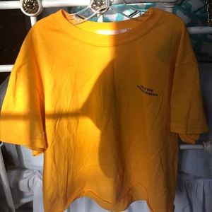 Yellow “ only the strong survive “ t shirt